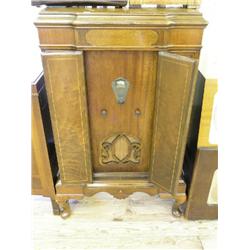 A 1930's Majestic Model 233 walnut radiogram, with Garrard Bakelite pick up, in veneered breakfront 