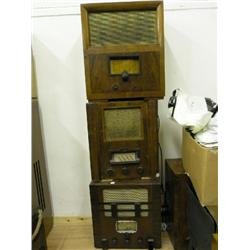 An Ultra Coronation twin set radio, a Bush Bakelite VHF 70 and a walnut radio  