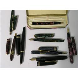 A Conway Stewart 'Dinkie' 550 fountain pen, with original price tag attached, two others and seven o