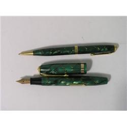 A cased Conway Stewart 84 pen and pencil duo set, with green pearl effect marble finish  