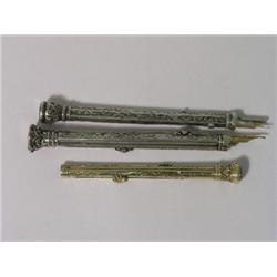 A Continental gilt metal propelling combination dip pen and pencil, with spider sliding mount, a sil