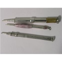 An S. Mordan & Co silver calendar propelling pencil, with shield shape jewelled mount, a pink enamel