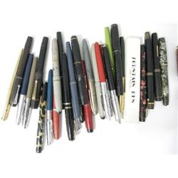 A large collection of fountain and ballpoint pens, including models by Osmiroid, Conway Stewart and 