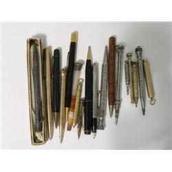 An S. Mordan & Co 9ct gold propelling pencil, with engine turned and dot finish, and a collection of