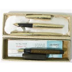 A Parker gold plated fountain pen and pencil duo set, and a Victory model with brown cap and herring