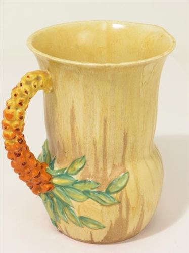 A Clarice Cliff My Garden Series Jug With Moulded Turnip Handle