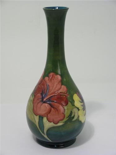 A Moorcroft Vase Hibiscus Tall Bulbous Shape With Red Leaves