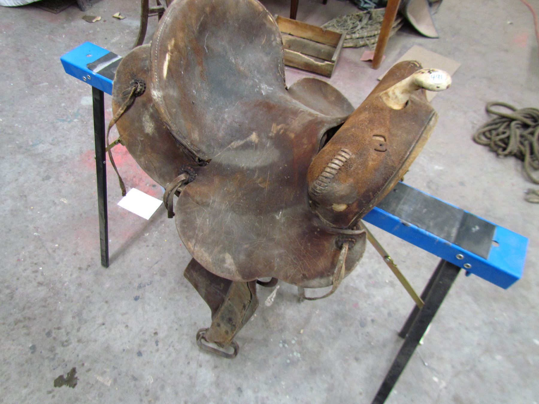 VINTAGE SADDLE (HIGH BACK ROPING) *METAL STIRRUPS* (12" BETWEEN BACK