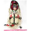 Image 1 : DOLL IN NATIVE CRAFTED CARRIER