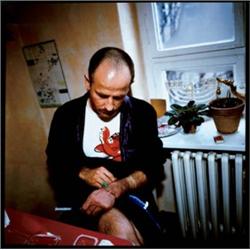 NAN GOLDIN     (b. 1953)     PIOTR WITH HIS AIDS MEDICATION, 1996     Cibachrome     31 x 31 in. (78