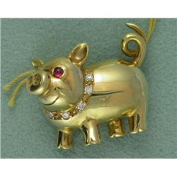 18K NEIMAN-MARCUS DIAMOND AND RUBY PIG BROOCH CONTAINING TWO (2) CABOCHON RUBY EYES AND A DIAMOND CO