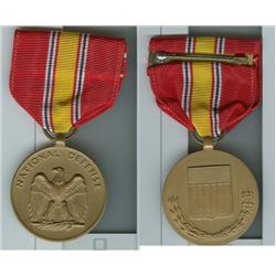 NATIONAL DEFENSE MEDAL ON DRESS RIBBON.