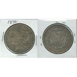 1890 MORGAN SILVER DOLLAR.
