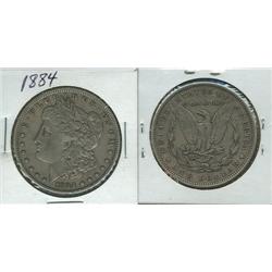 1884 MORGAN SILVER DOLLAR.