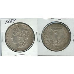 1885 MORGAN SILVER DOLLAR.