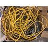 Image 2 : Pallet of 100's of ft of various extension cords, portable heater, rolls of adding machine tape, por