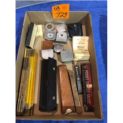 Various tape measures, pocket guages (air pressure & tire pressure), level, geometry set