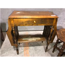 Antique coffee table magazine rack comes with plant stand