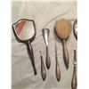 Image 2 : Antique silver personal care items, mirrors, brushes, comb, several items marked "Birks Sterling"