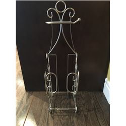 Metal magazine rack about 24" tall