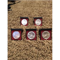 five - 10 dollar collector coins from the Montreal 1976 Olympics