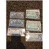 Image 1 : Canadian one dollar bills, two from 1937, five from 1954, 17 from 1967, 1 from 1973
