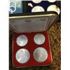 Image 8 : Full series of seven sets of four 1976 Montreal Olympic coins (inserts say these coins are 92.5% sil