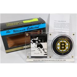 WILLIE O'REE AUTOGRAPHED PUCK FRAMED.