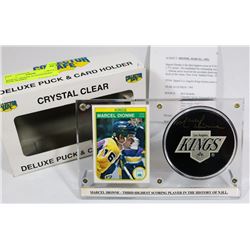 MARCEL DIONNE AUTOGRAPHED PUCK FRAMED.