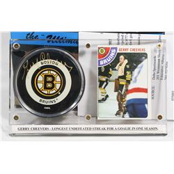 GERRY CHEEVERS AUTOGRAPHED HOCKEY PUCK IN HOLDER.