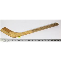 1970S TEAM SIGNED OILERS WHA HOCKEY STICK.