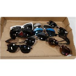 FLAT OF DESIGNER REPLICA NEW AND USED SUNGLASSES
