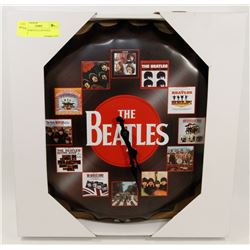 BEATLES BOTTLE CAP STYLE CLOCK.