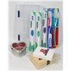Image 1 : BAG OF ASSORTED INCLUDING TOOTHBRUSHES AND MORE.