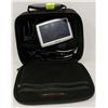 Image 1 : TOMTOM GPS IN ROOTS BAG FOR PARTS.