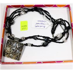 BLACK BEADED NECKLACE AND HANDMADE PENDANT