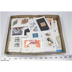 BOX WITH LARGE WORLD STAMP COLLECTION.