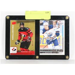2 FRAMED EVAN BOUCHARD ROOKIE CARDS.