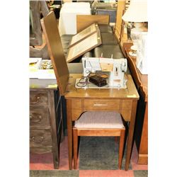 SINGER SEWING MACHINE WITH CABINET AND STOOL.