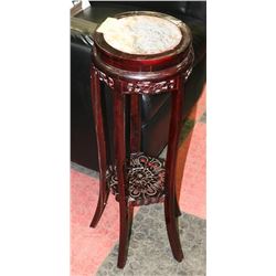 HANDCARVED PLANT STAND.