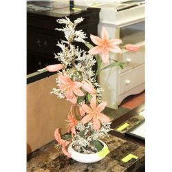 FLOWER ARRANGEMENT WITH WHITE POT.