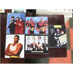 LOT OF 5 SIGNED WWE WRESTLING PHOTOS WITH COAS