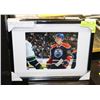 Image 1 : FRAMED RYAN NUGENT-HOPKINS AUTOGRAPHED PHOTO.