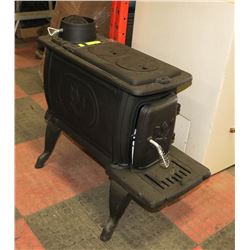 MEDIUM CAST IRON LOG WOOD STOVE