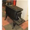 Image 1 : MEDIUM CAST IRON LOG WOOD STOVE