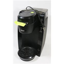 OSTER KEURIG COFFEE MAKER.