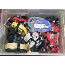 CLEAR BIN FULL OF DIE DOWN STRAPS AND