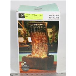 DECORATIVE TABLETOP FOUNTAIN W/ PEBBLES.