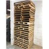 Image 1 : STACK OF ASSORTED WOOD PALLETS
