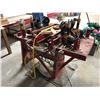 Image 2 : CUSTOM BUILT PNEUMATIC TRUSS NAILING SYSTEM ON METAL STAND INCLUDES: 4 BOSTITCH COIL NAIL GUNS &